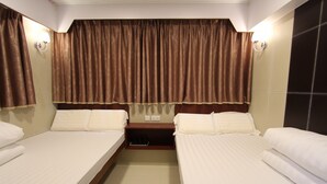 A hotel room with two beds, a nightstand, and a large window with brown curtains. - Prince Hotel (Kowloon)
