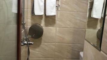 Shower, free toiletries, hair dryer, slippers