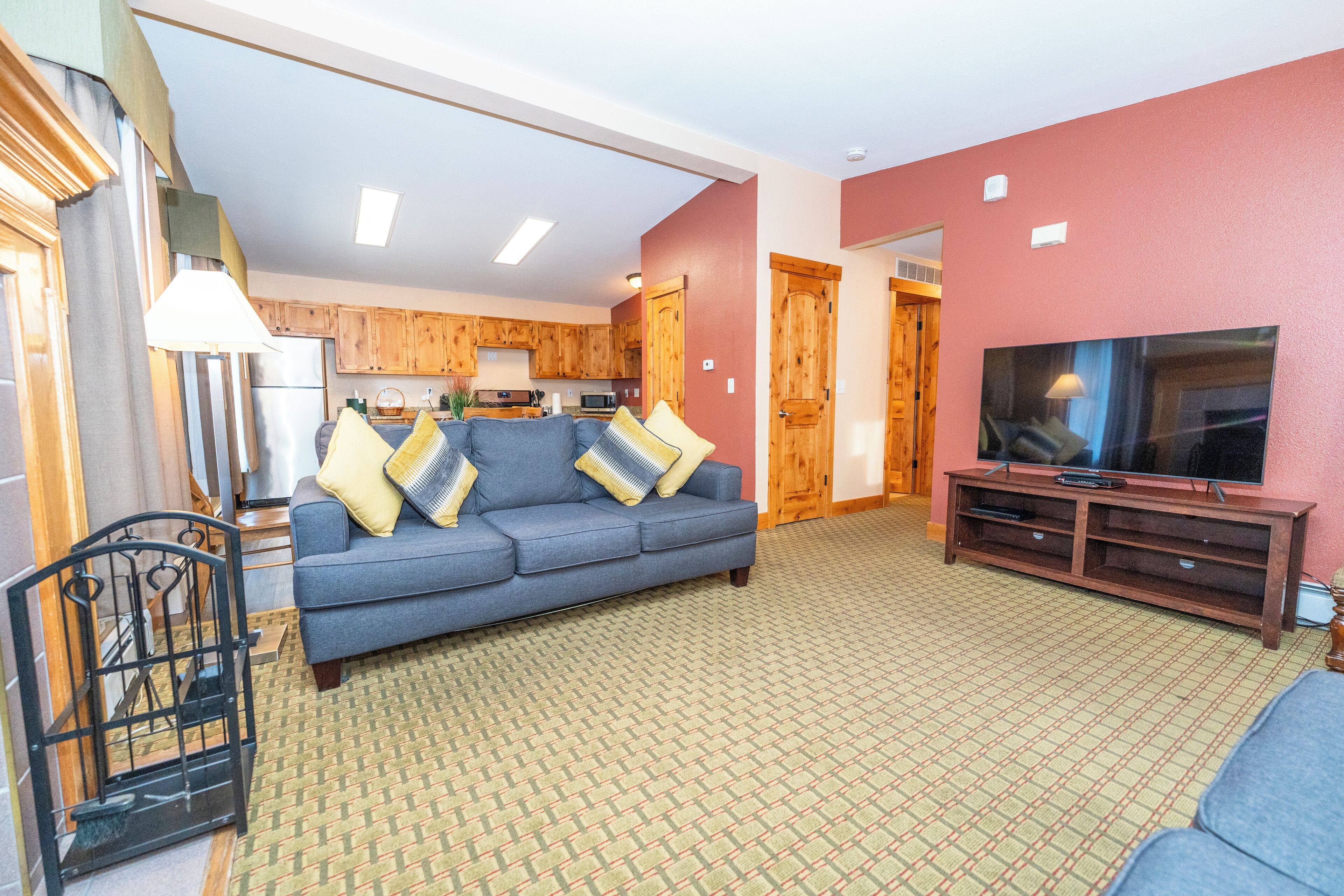 family apartment, multiple beds (not pet friendly) | living room | tv