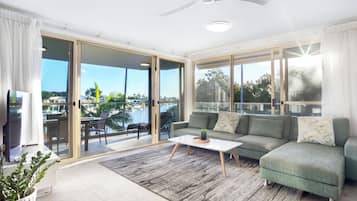 2 Bedroom Sub-Penthouse River Front Apartment | Living area | 50-inch flat-screen TV with digital channels, TV