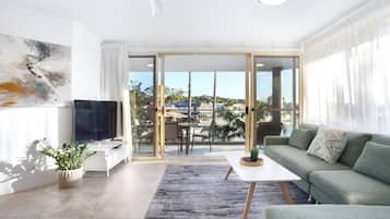2 Bedroom Sub-Penthouse River Front Apartment | Living area | 50-inch flat-screen TV with digital channels, TV