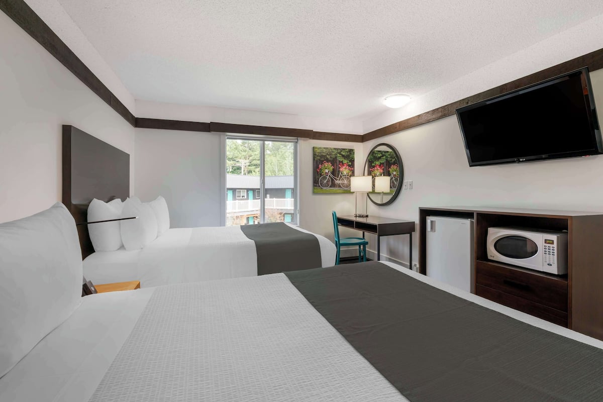 hypo-allergenic bedding, pillow-top beds, in-room safe, desk