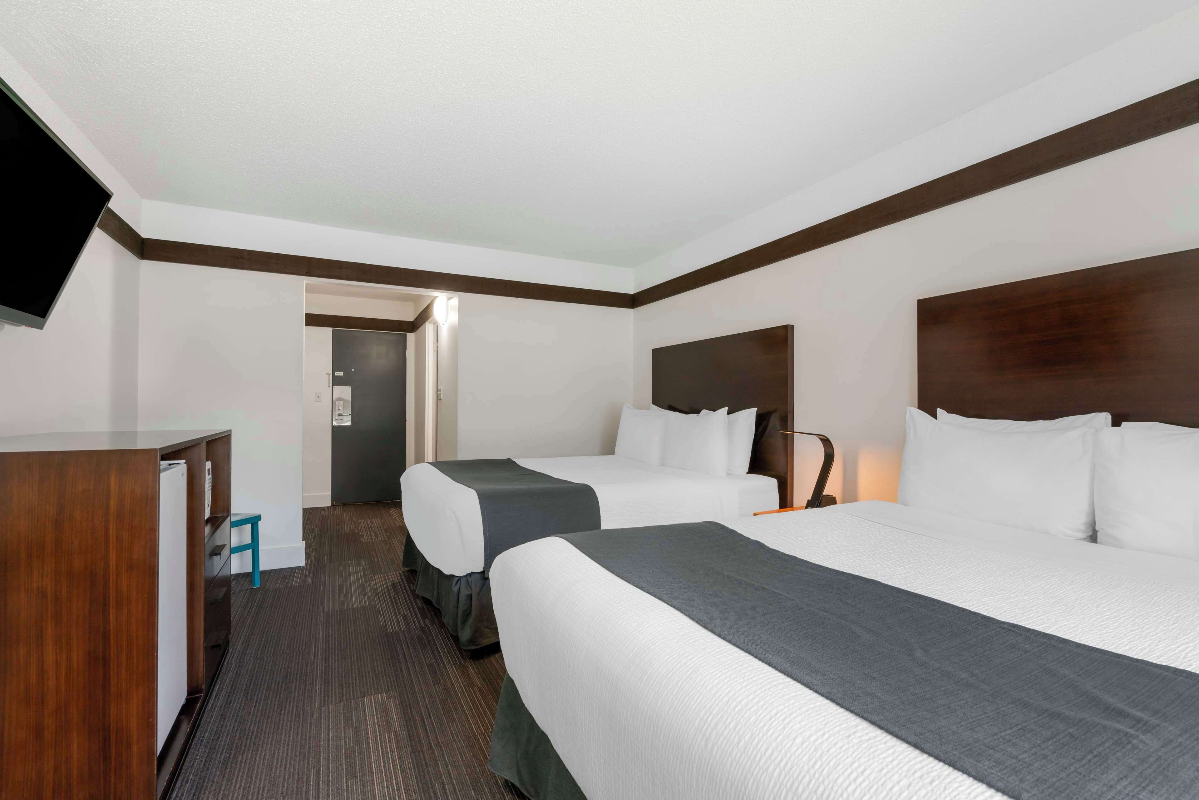 hypo-allergenic bedding, pillow-top beds, in-room safe, desk