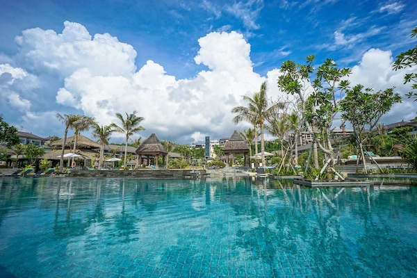 Outdoor pool, pool umbrellas, sun loungers