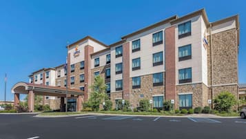 Experience a functional, contemporary hotel with a welcoming entrance and convenient parking.