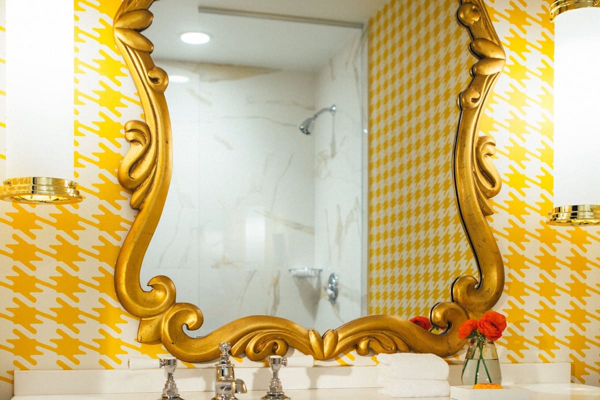 Designer toiletries, hair dryer, bathrobes, towels