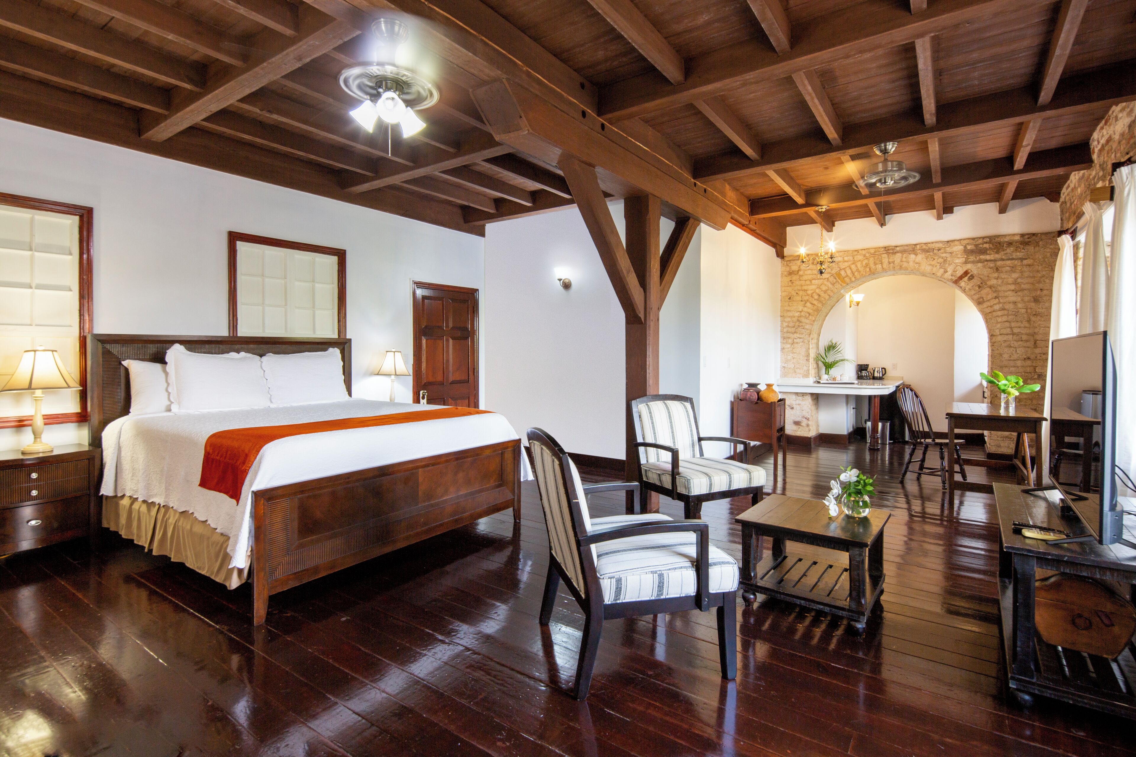 contemporary studio (continental breakfast included) | living area | 65-inch flat-screen tv with cable channels, tv