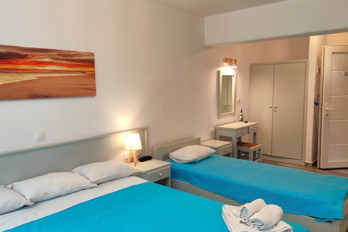Economy Room (Semi Basement) | In-room safe, blackout drapes, iron/ironing board, WiFi (free)