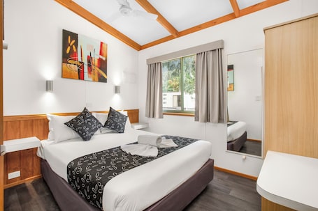 Deluxe Cabin | Premium bedding, individually furnished, bed sheets, wheelchair access. Breeze Holiday Parks - Halls Gap