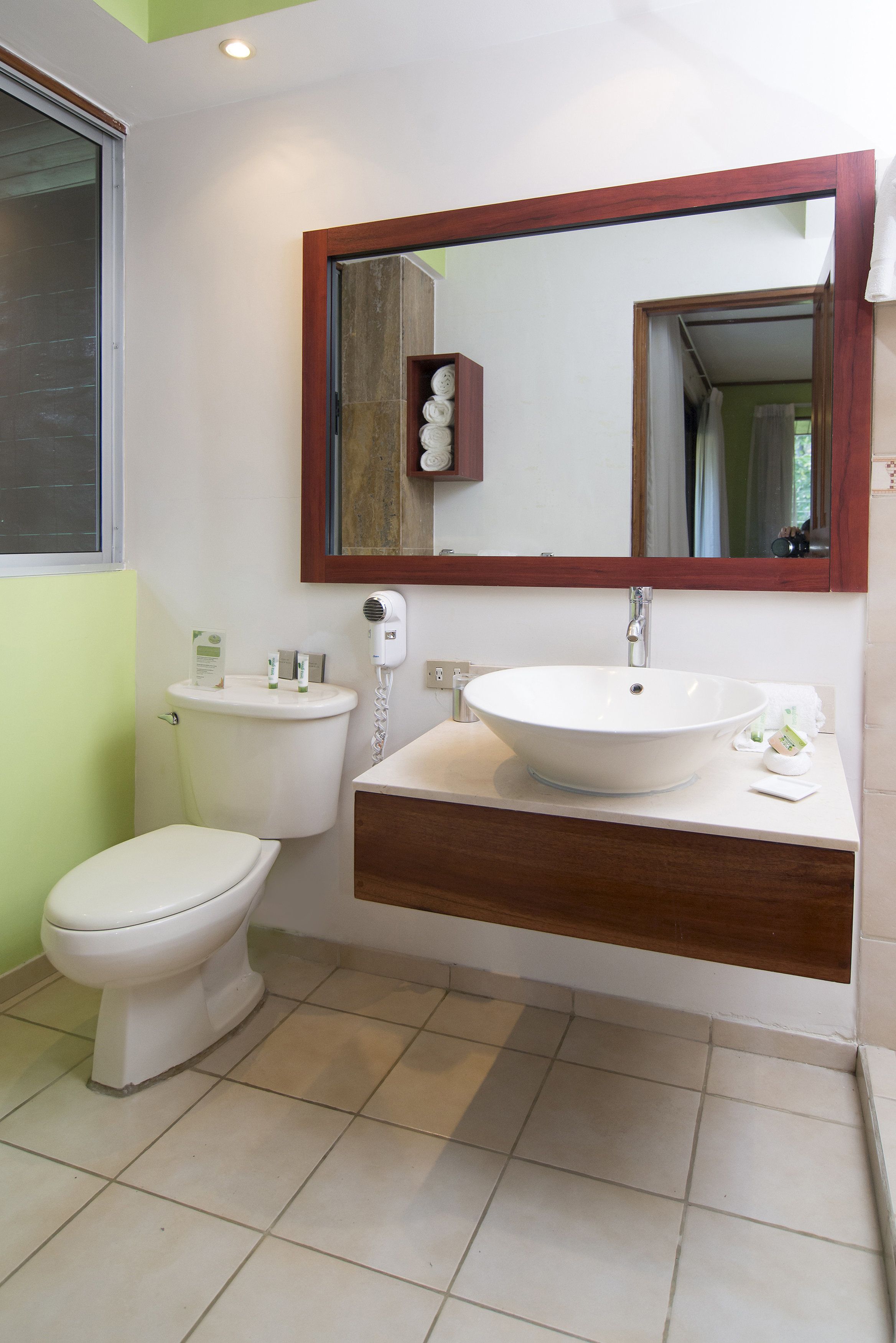 deluxe room (private garden) | bathroom | eco-friendly toiletries, hair dryer, towels