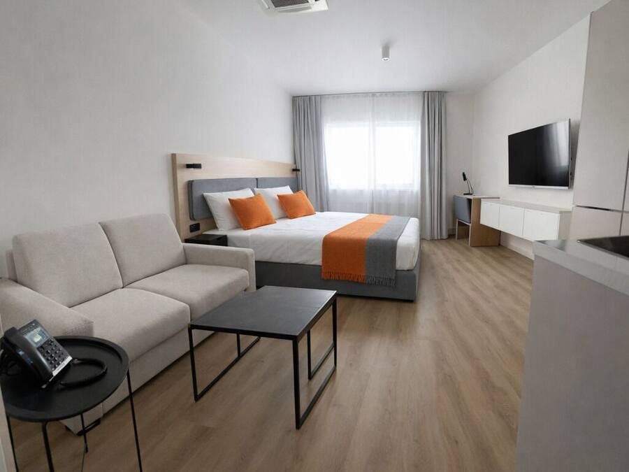 Basic Apartment | Minibar, in-room safe, desk, free WiFi