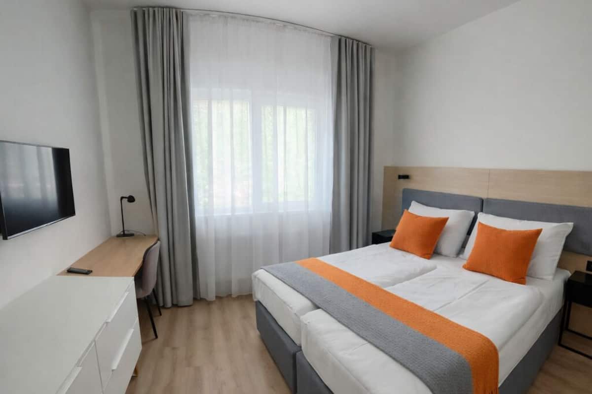 Superior Apartment, 2 Bedrooms | Minibar, in-room safe, desk, free WiFi