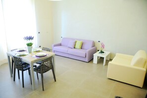 Superior Apartment, Balcony | Living area | Flat-screen TV - Hotel Città Bella (Gallipoli)
