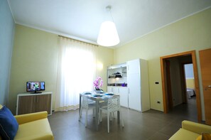 Superior Apartment, Balcony | Living area | Flat-screen TV - Hotel Città Bella (Gallipoli)