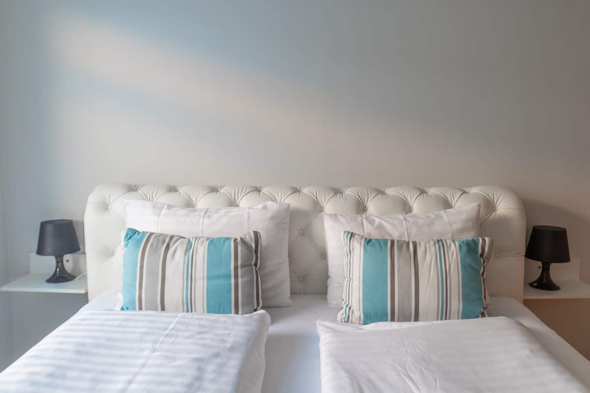 1 chambre, literie de qualité, ameublement unique