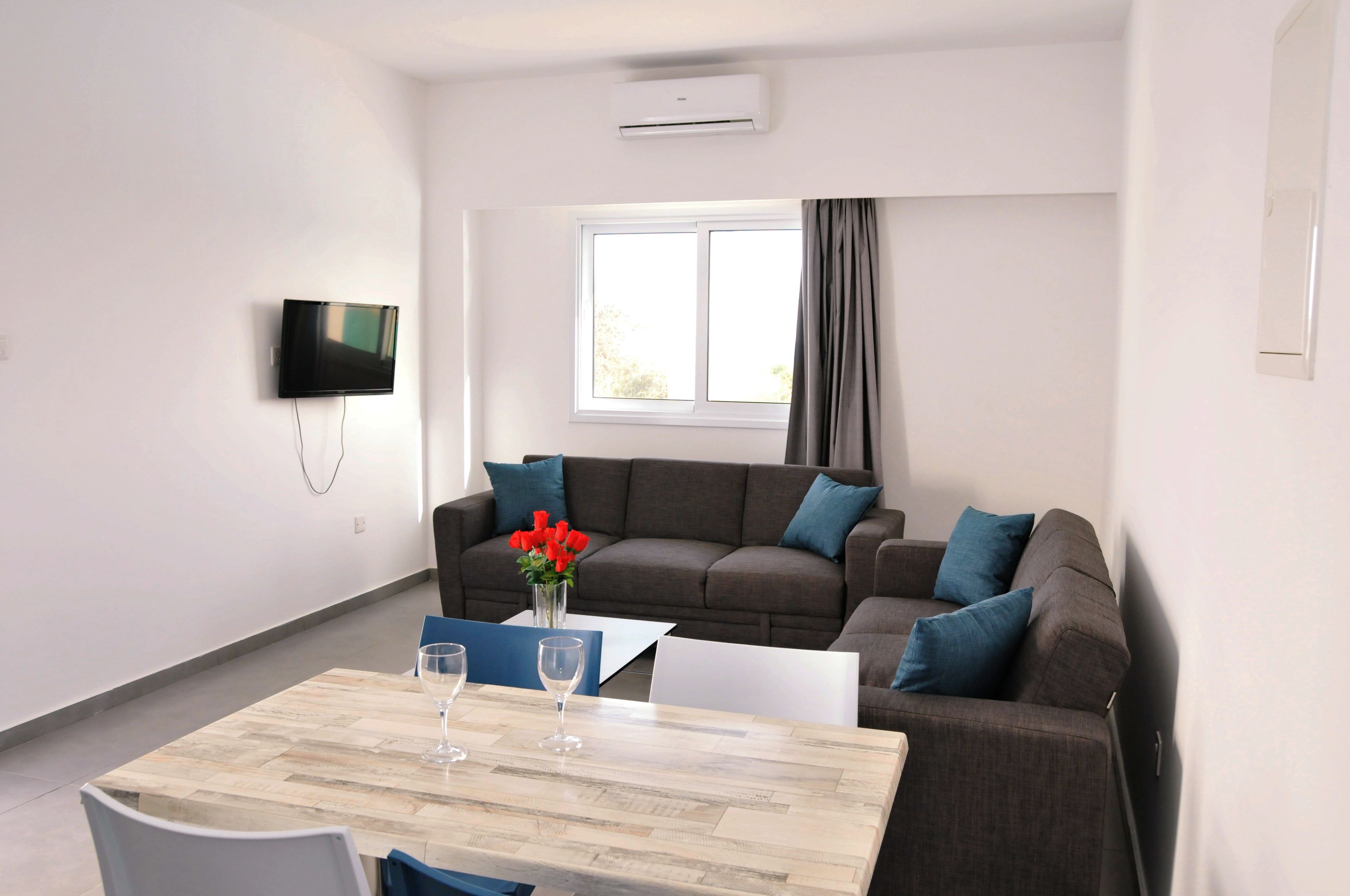 Deluxe Apartment, 1 Bedroom, Pool View | Living room | 32-inch LED TV with satellite channels, TV