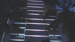 A modern building with a 'SUSUZUKI' sign, featuring a staircase and potted plants at the entrance. - Susuzlu Hotel (Izmir)
