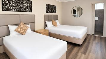 Deluxe Twin Room | Escritorio, espacio para trabajar con un portátil, cortinas opacas