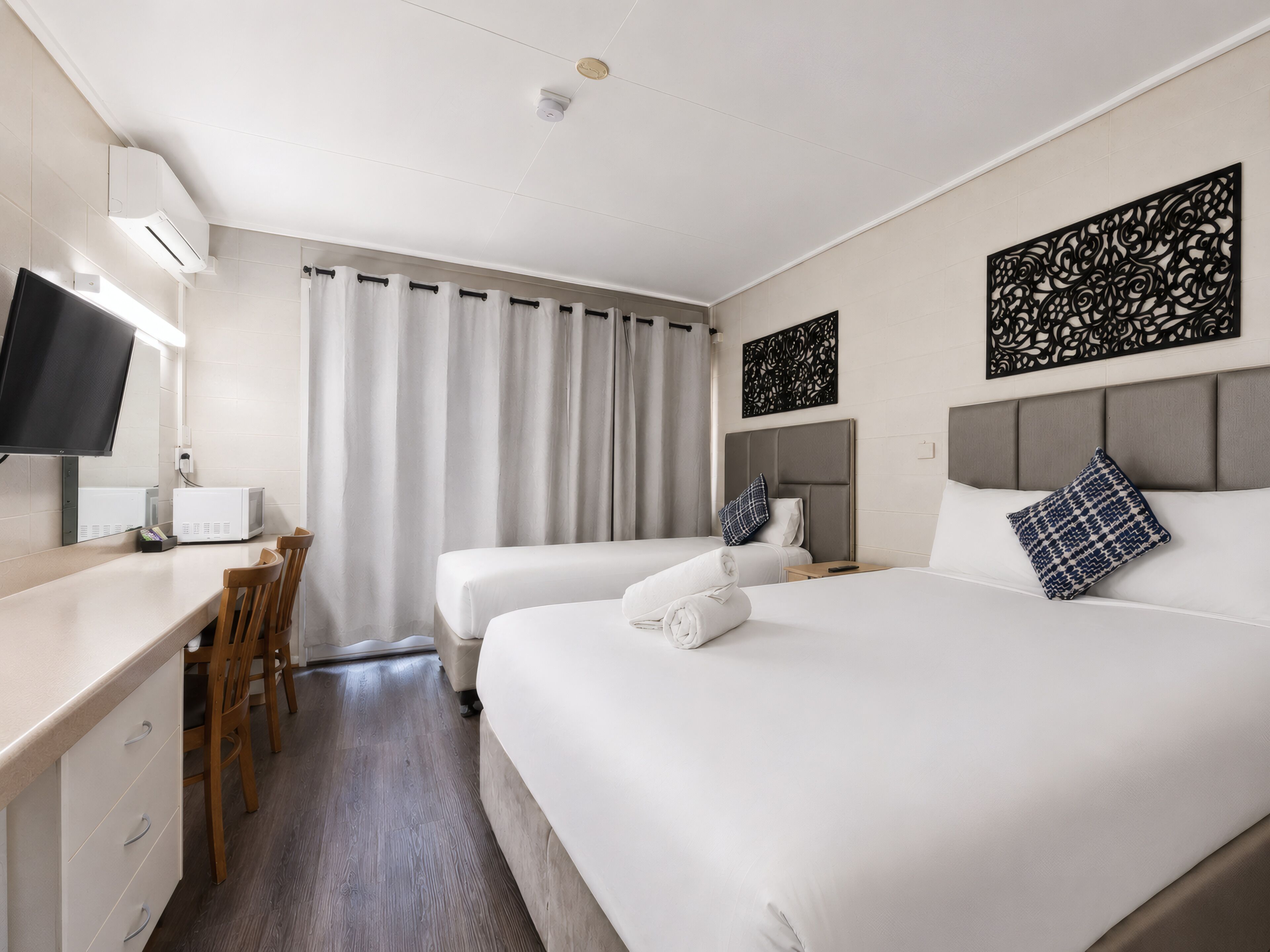 Deluxe Twin Room | Escritorio, espacio para trabajar con un portátil, cortinas opacas