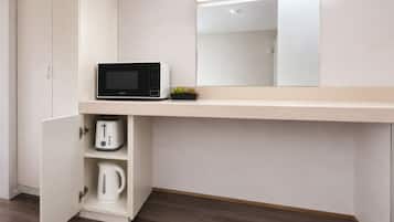 Deluxe King Room | Escritorio, espacio para trabajar con un portátil, cortinas opacas