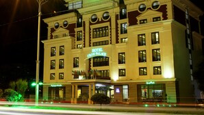 A multi-story hotel with a prominent "HOTEL" sign and "CRON PALACE" branding. - Cron Palace Tbilisi Hotel (Tbilisi)