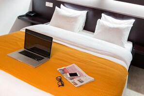 Hypo-allergenic bedding, in-room safe, desk, blackout curtains