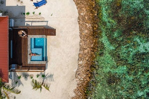 Oceanfront Honeymoon Suite w/ Private Pool | Egyptian cotton sheets, premium bedding, memory foam beds, in-room safe