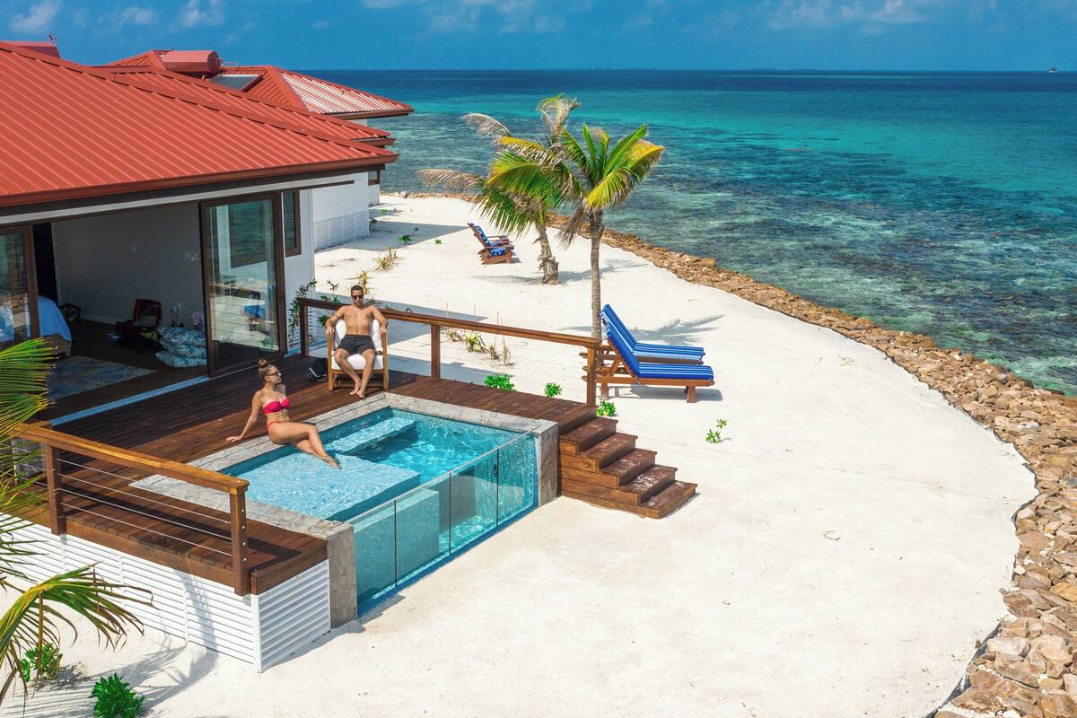 Oceanfront Honeymoon Suite w/ Private Pool | Egyptian cotton sheets, premium bedding, memory-foam beds, in-room safe