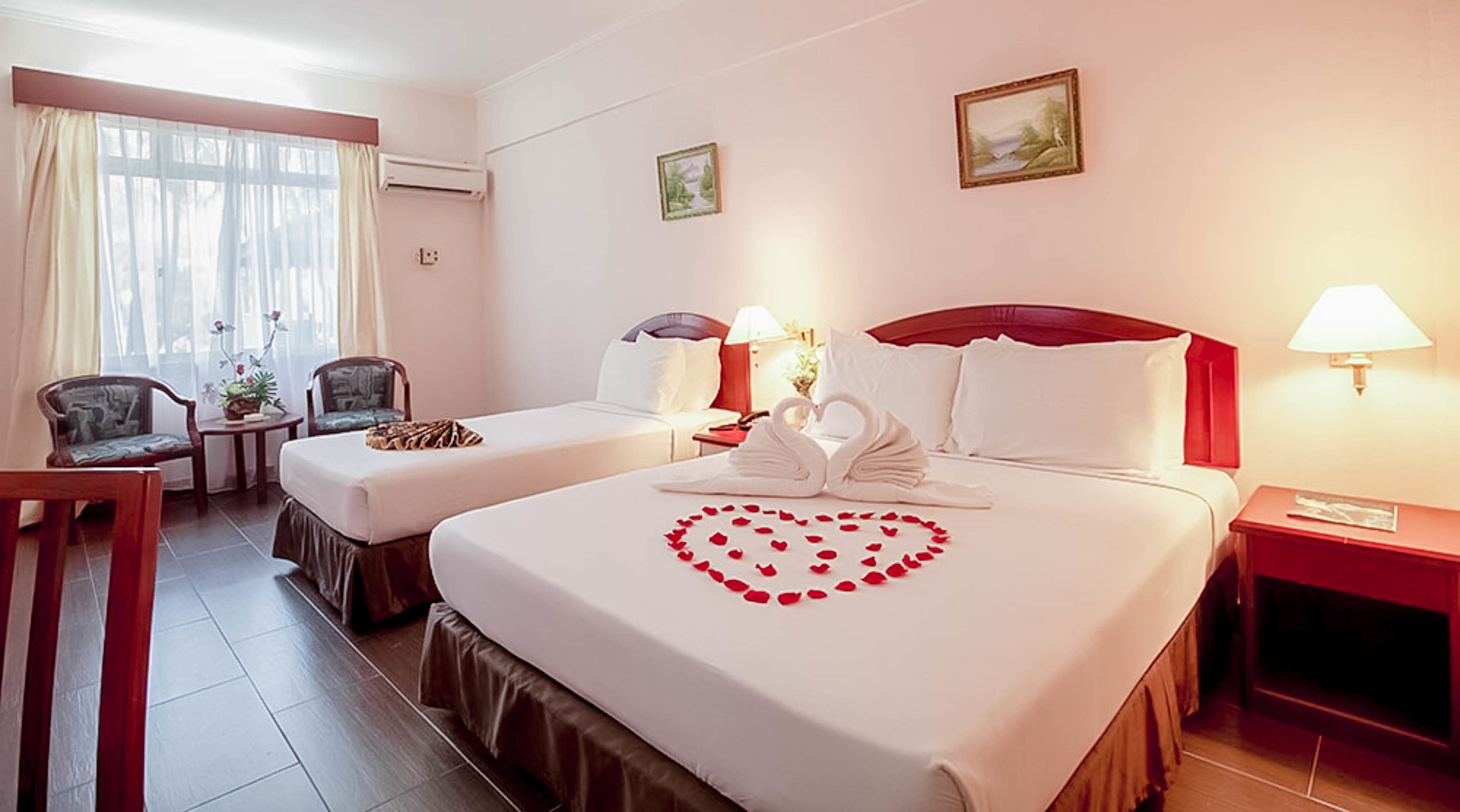 Minibar, desk, bed sheets