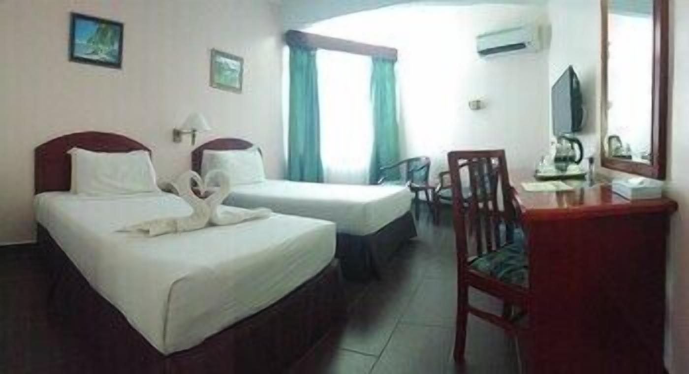 Minibar, desk, bed sheets