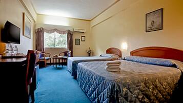 Family Room | Minibar, free WiFi, bed sheets