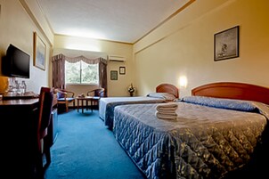 Family Room | Minibar, free WiFi, bed sheets