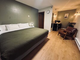 Tabla de planchar con plancha, wifi gratis y ropa de cama 