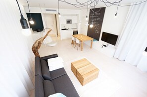 Premium Apartment, 1 Bedroom, Accessible, Kitchenette | Living area | Flat-screen TV