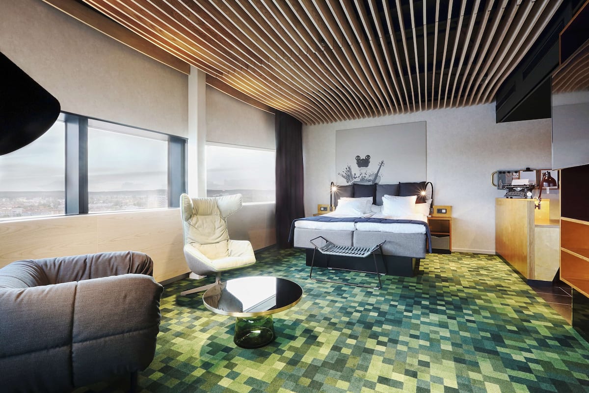 junior suite, 1 queen bed, non smoking | 1 bedroom, in-room safe, laptop workspace, blackout curtains