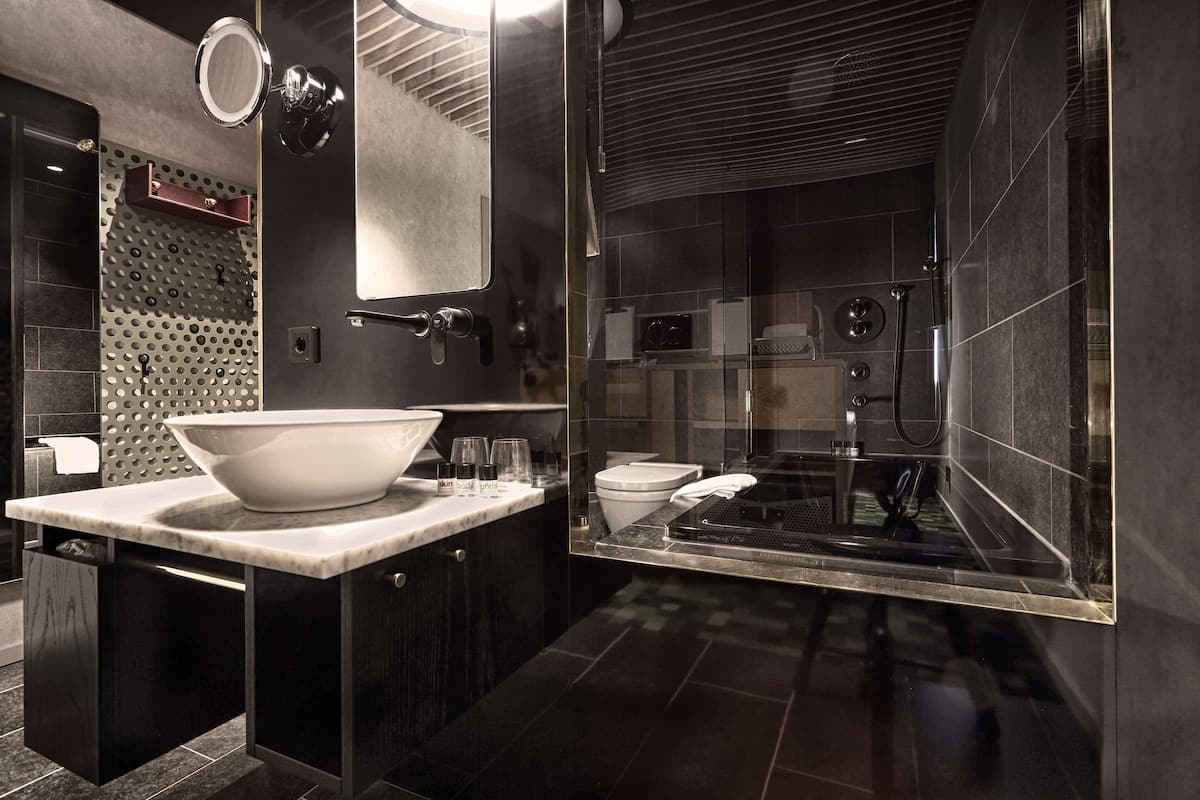 shower, rainfall showerhead, hair dryer, towels