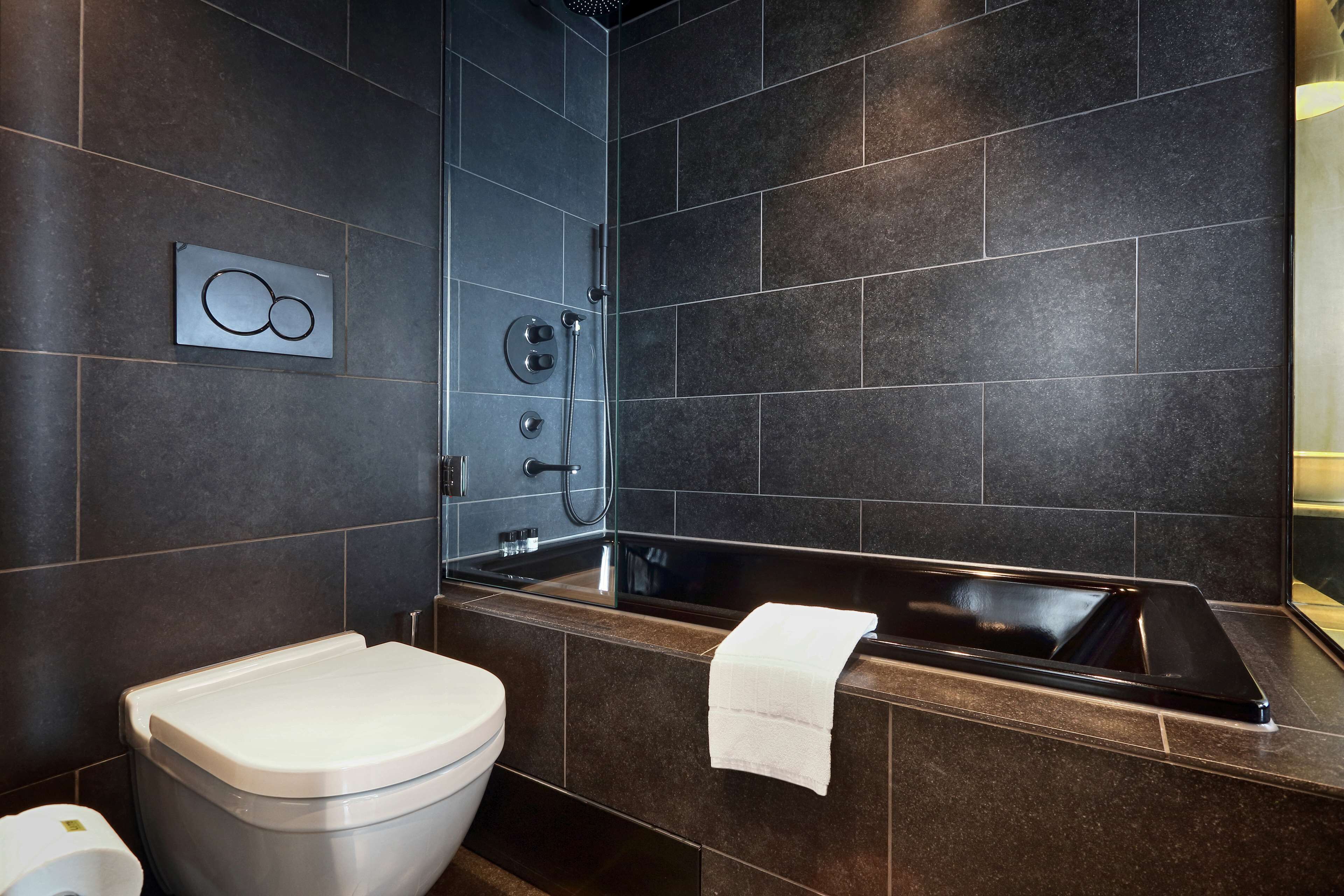 shower, rainfall showerhead, hair dryer, towels