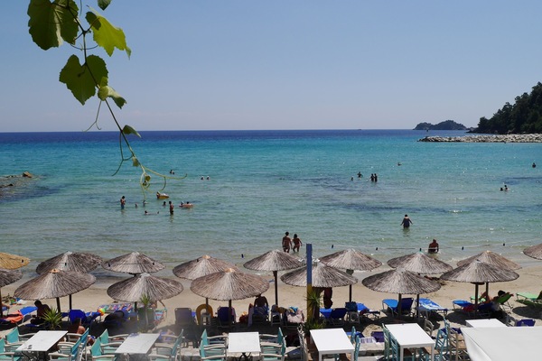 Private beach, white sand, sun loungers, beach umbrellas