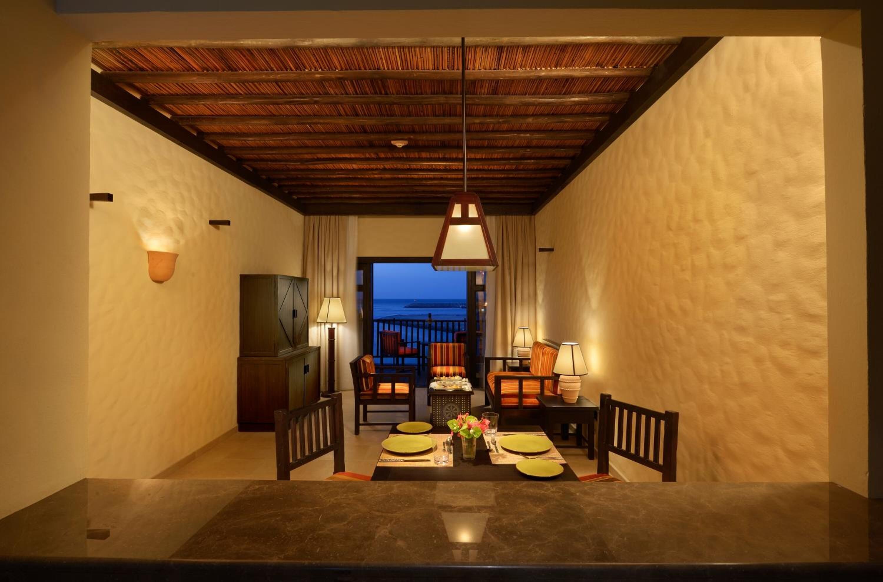 deluxe duplex, balcony | living area | lcd tv