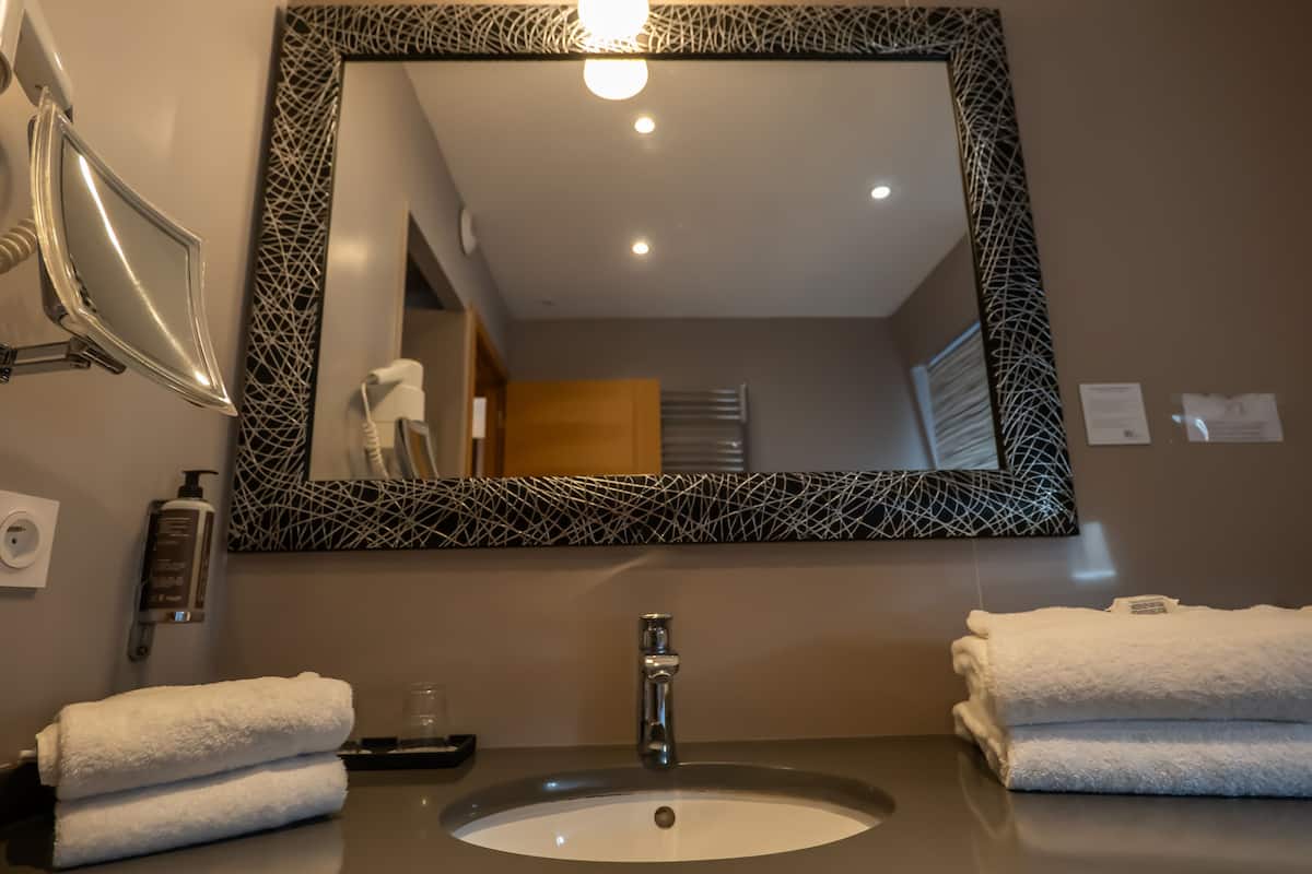 prestige room (1 to 4 persons) | bathroom | free toiletries, hair dryer, towels, soap