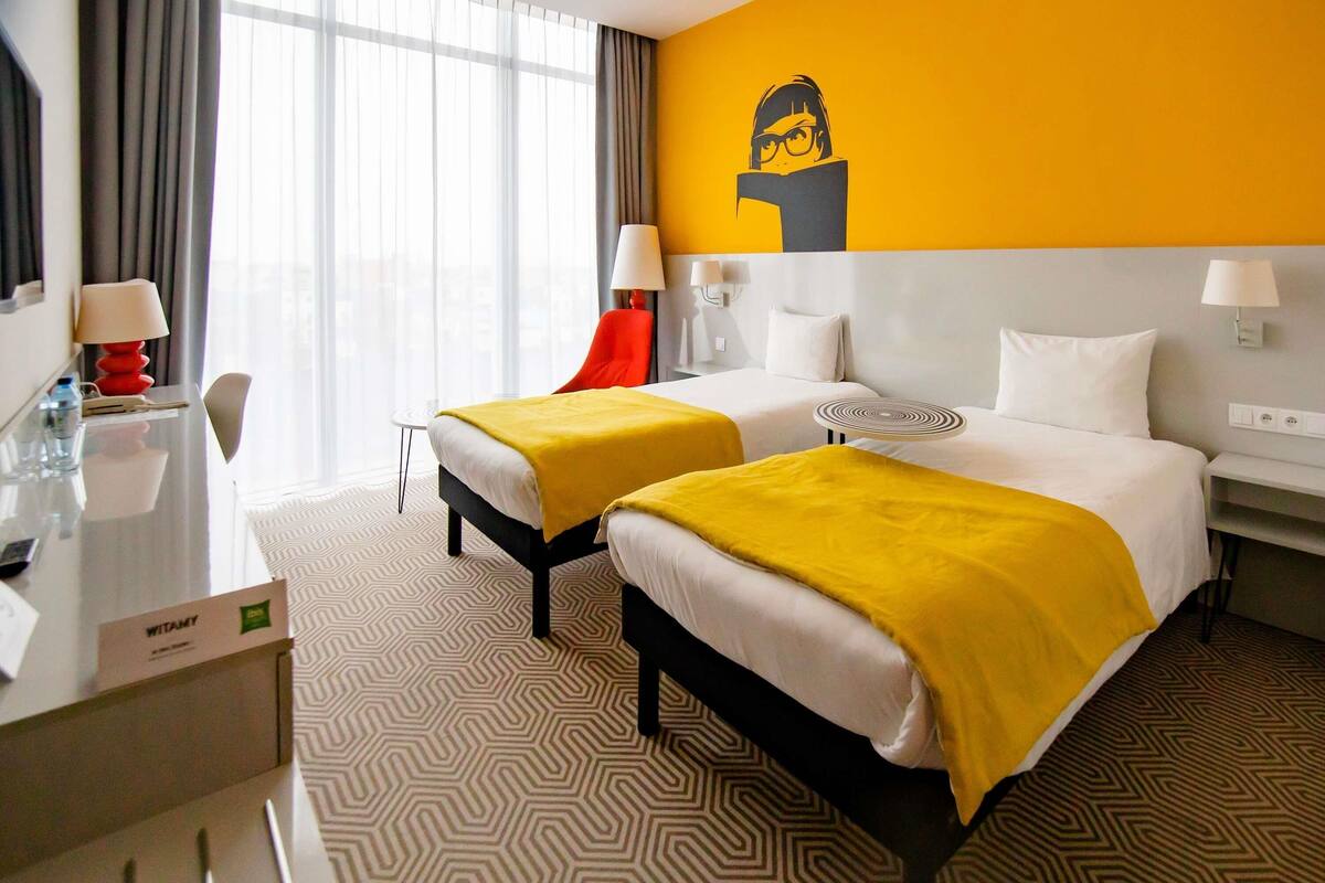 Hypo-allergenic bedding, desk, blackout drapes, soundproofing