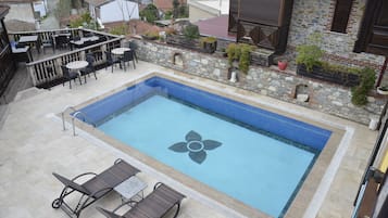 Outdoor pool, pool umbrellas, sun loungers