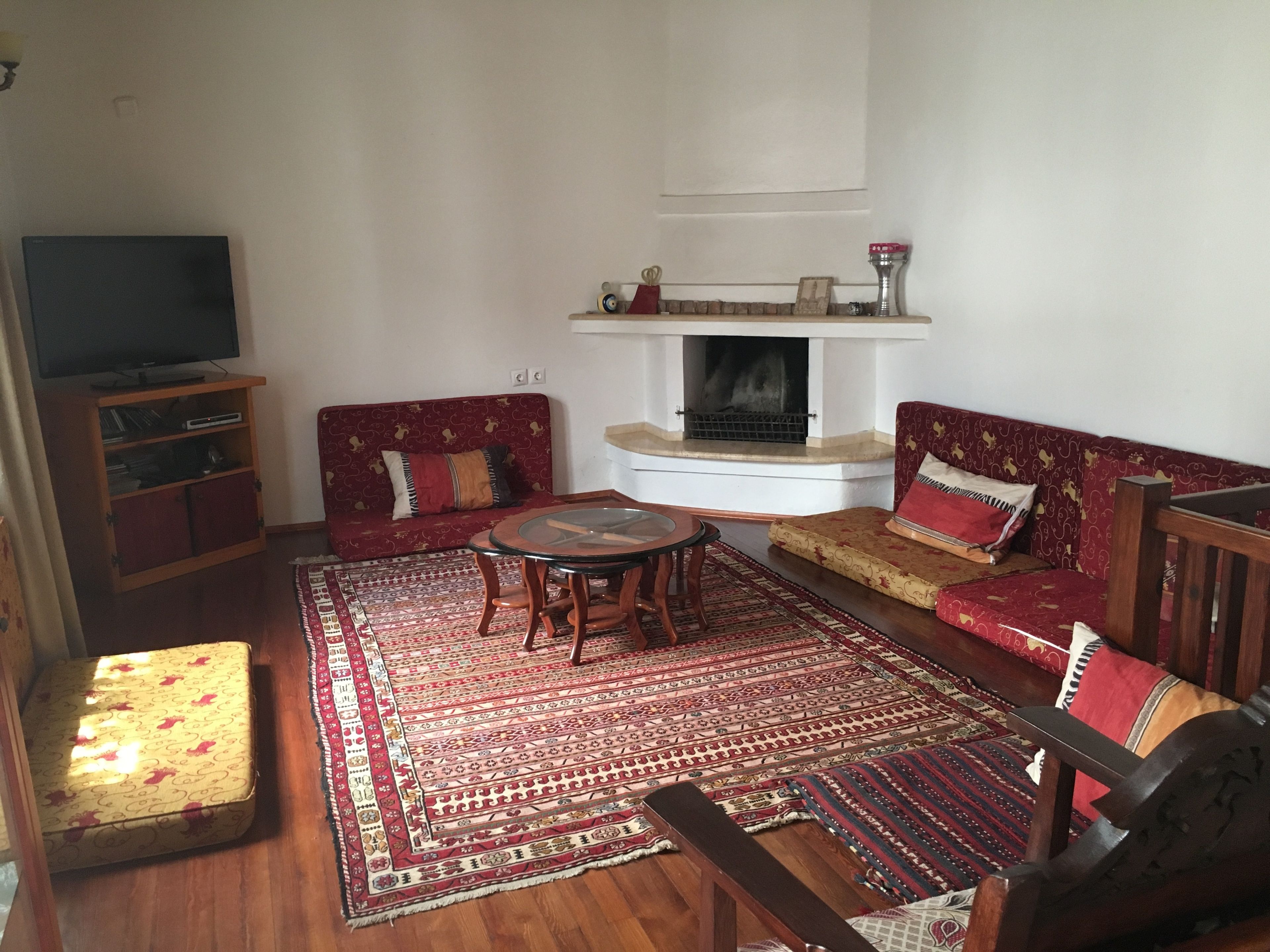 villa (ayasoluk house ) | living room | 84-inch flat-screen tv with satellite channels, tv