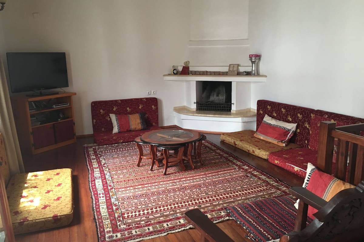 villa (ayasoluk house ) | living room | 84-inch flat-screen tv with satellite channels, tv