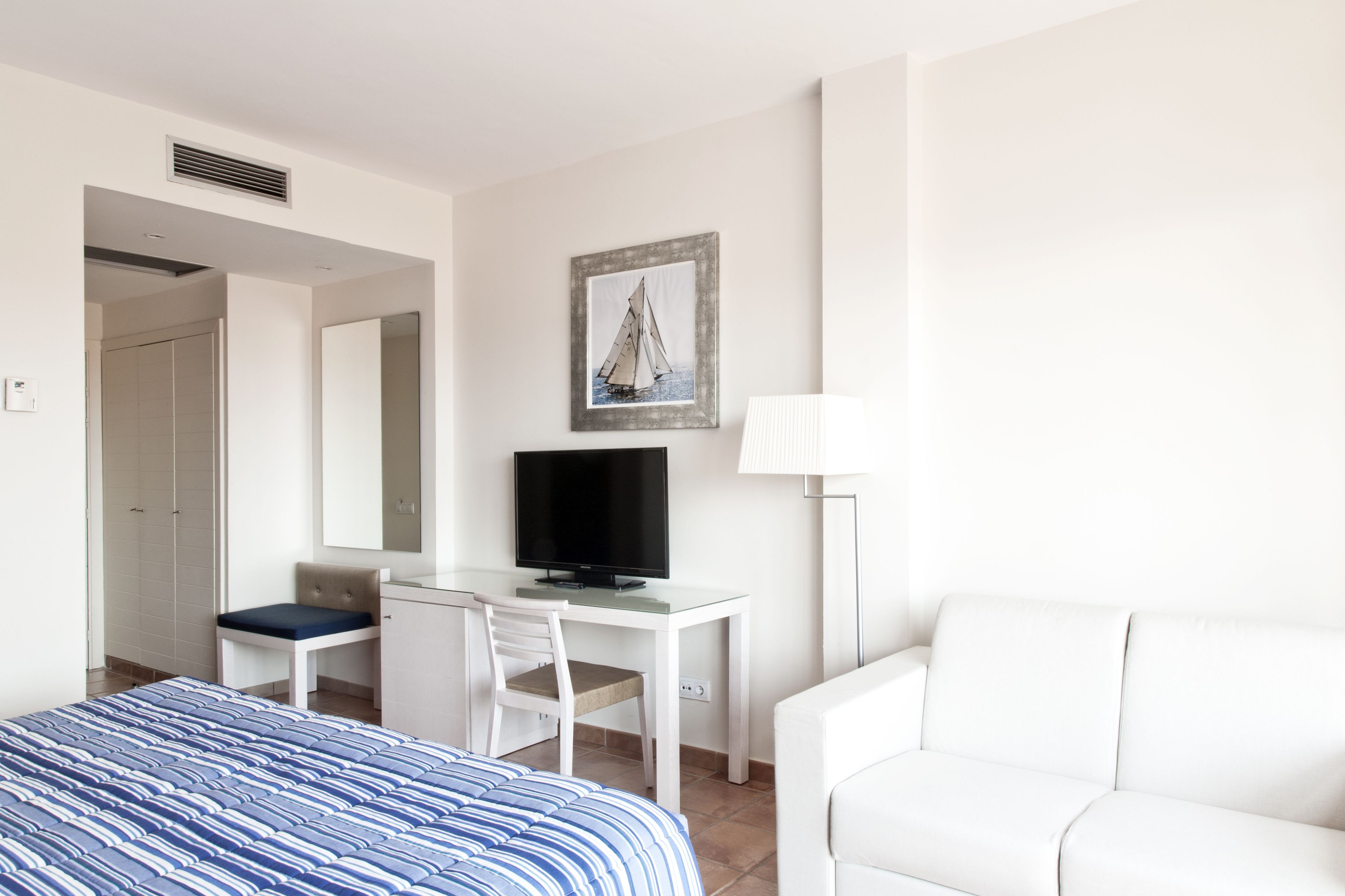 standard room, 3 adults (port aventura tickets & 1 ferrari land ticket) | in-room safe, desk, laptop workspace, free wifi