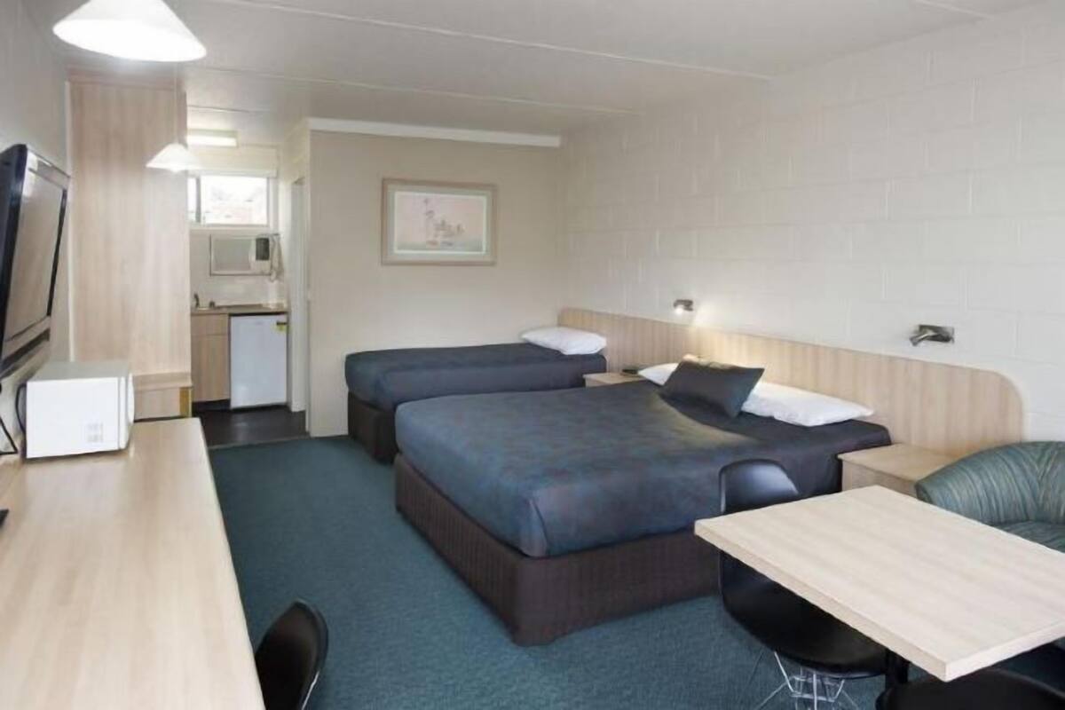 Desk, blackout drapes, iron/ironing board, free WiFi