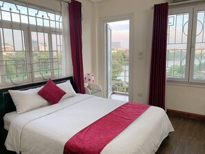Deluxe Double Room, 1 Queen Bed, Lake View | Minibar, in-room safe, desk, blackout curtains - Heart Hotel (Hanoi)