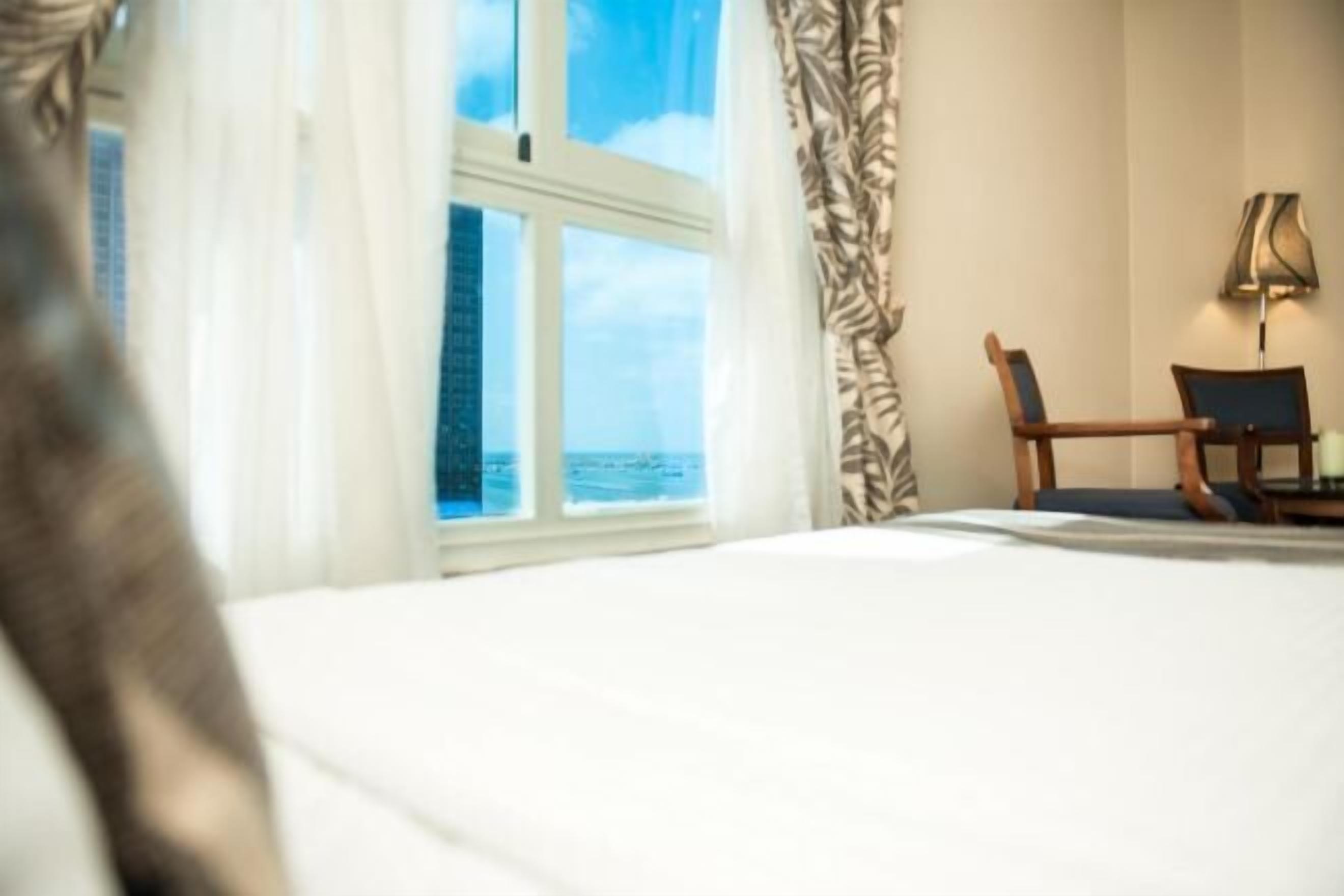 In-room safe, desk, blackout drapes, free cribs/infant beds