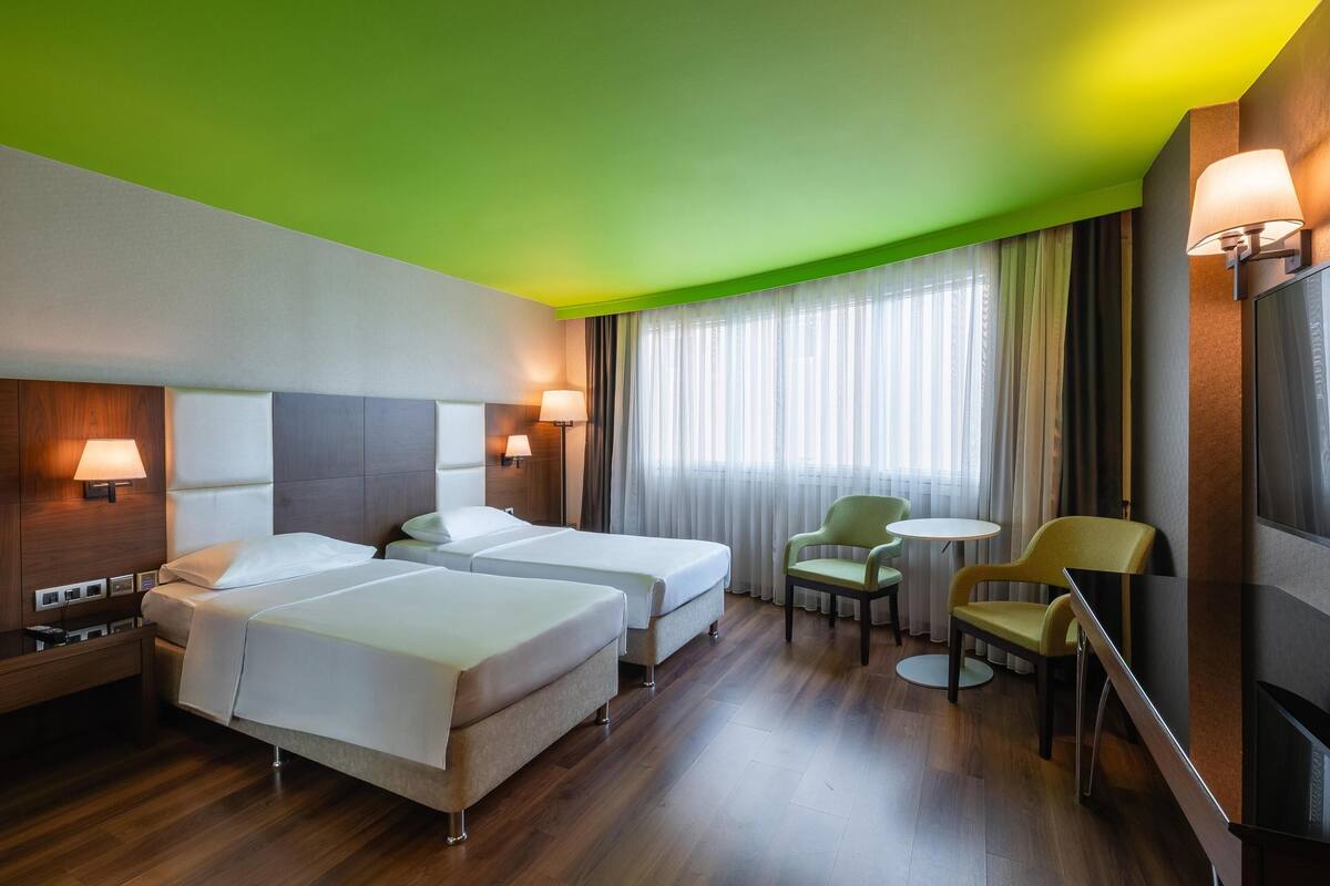 Superior Room | Minibar, in-room safe, desk, blackout curtains