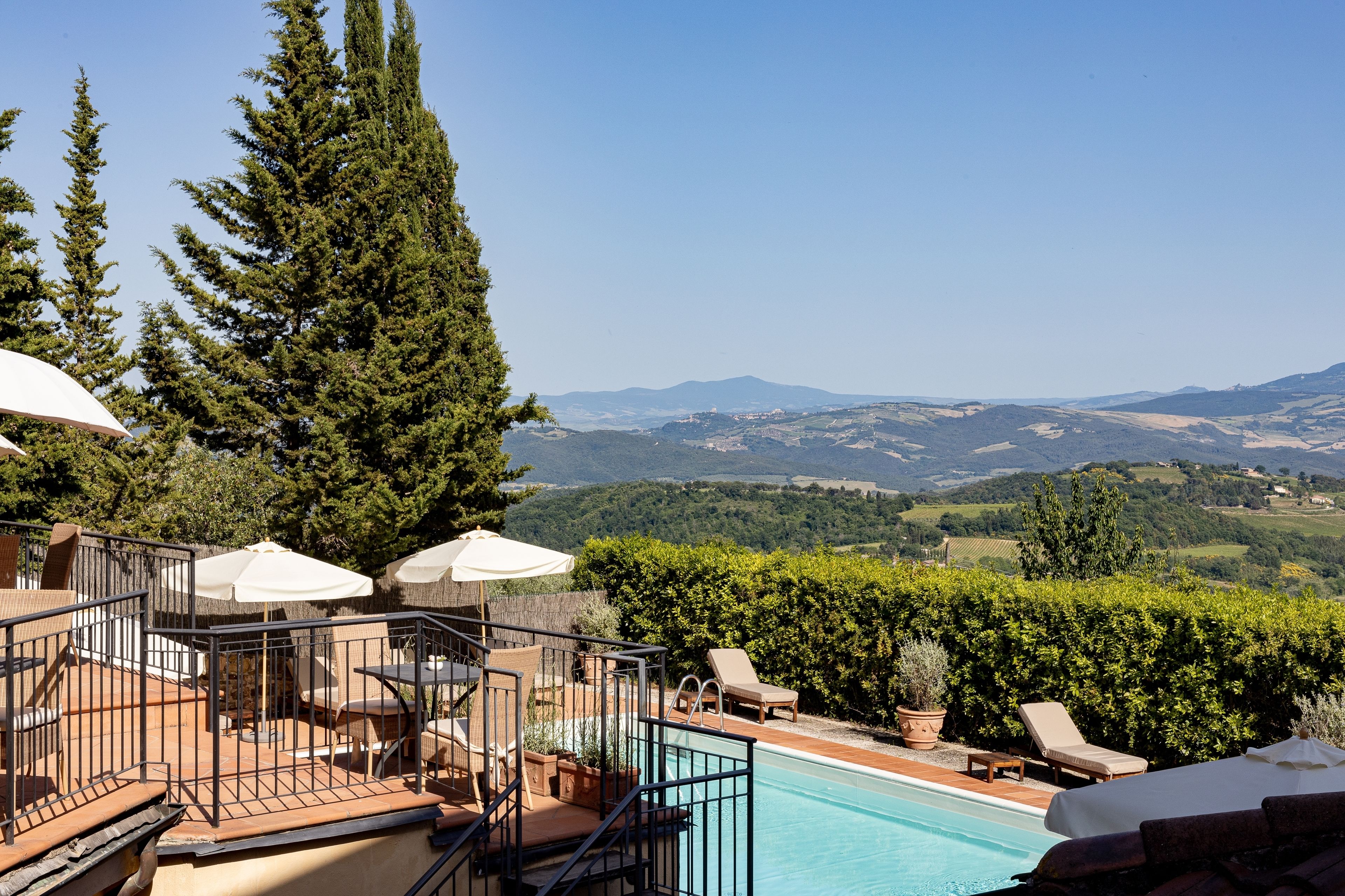 seasonal outdoor pool, open 9:30 am to 7:00 pm, pool umbrellas